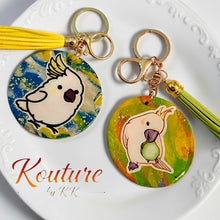Load image into Gallery viewer, Handmade Cockatoo Hand-Sculpted Polymer Clay Keychain with Resin Overlay — Bird Keychain
