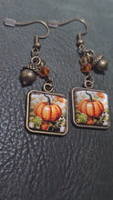 Load and play video in Gallery viewer, Harvest Pumpkin Earrings – Antique Bronze Fall Dangle Earrings with Acorn Charm
