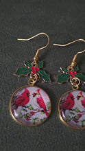 Load and play video in Gallery viewer, Christmas Cardinal Holly Dangle Earrings – Glass Dome &amp; Enamel Holly Charm | Kouture by KK
