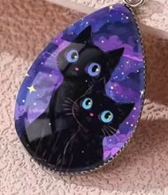 Load image into Gallery viewer, Handmade black cat galaxy polymer clay keychain by Kouture by KK
