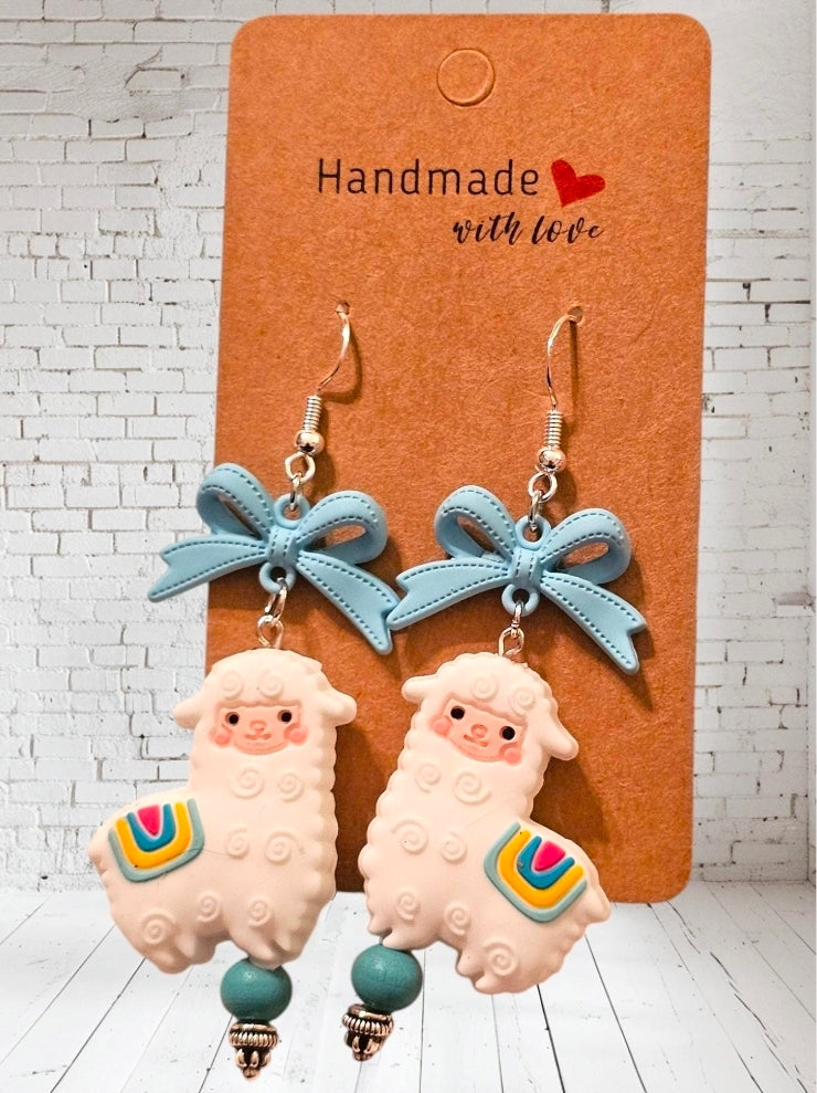 White Llama Alpaca Earrings - Folk Art with Rainbow Blanket, Blue Bow & Turquoise Bead, Sterling Silver Hooks
