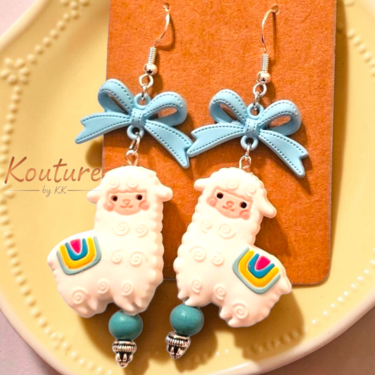 White Llama Alpaca Earrings - Folk Art with Rainbow Blanket, Blue Bow & Turquoise Bead, Sterling Silver Hooks